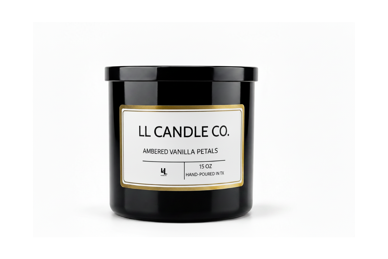 A 15 oz black glass jar candle by LL Candle Co. with a white label and gold border, reading 'Ambered Vanilla Petals'.