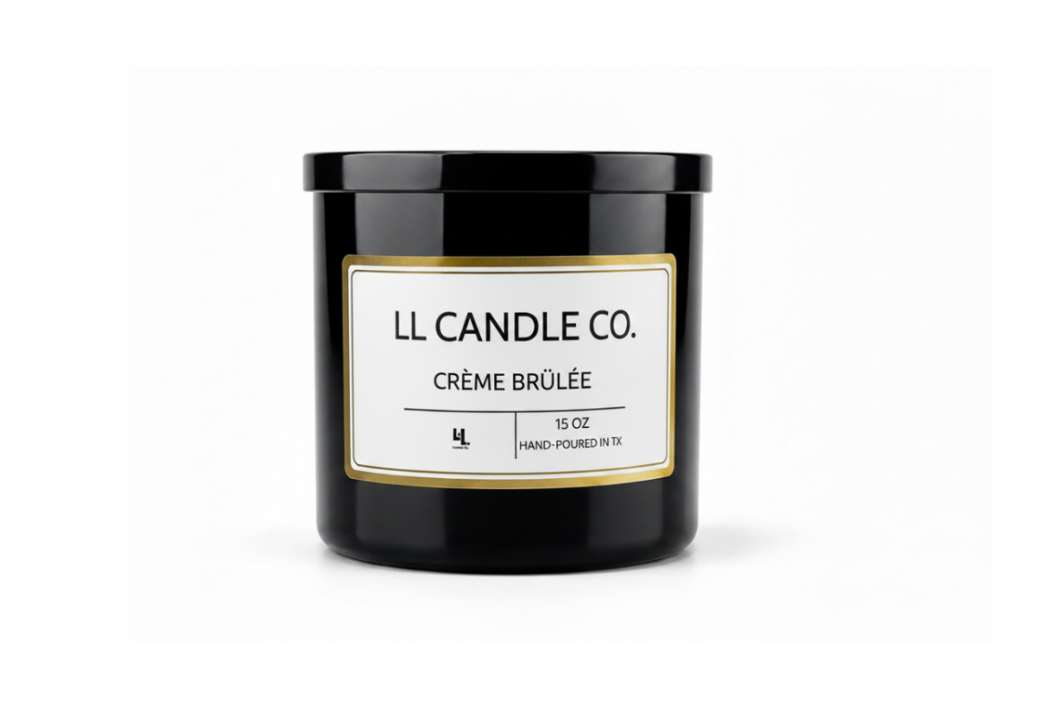 A black glass jar candle with a white label and gold border, labeled 'LL CANDLE CO. CRÈME BRÚLÉE', on a clean white background.