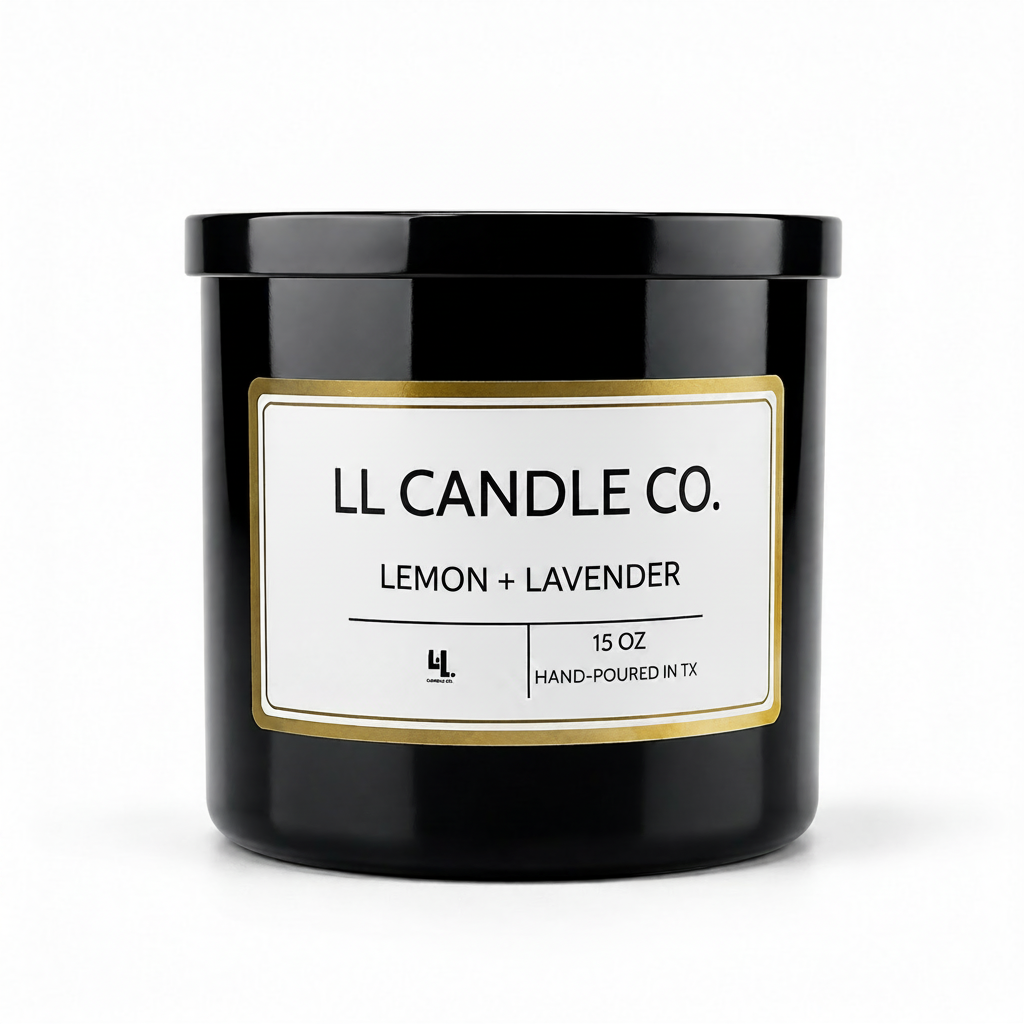 A black glass jar candle with a white label and gold border, labeled 'LL CANDLE CO. LEMON + LAVENDER' on a clean white background.