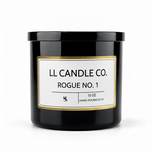 A black glass jar candle with a white label and gold border, reading 'LL CANDLE CO. ROGUE NO. 1' on a clean white background.