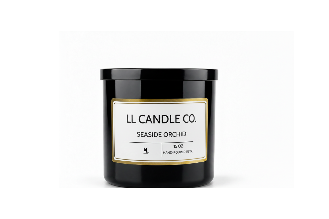 A black glass jar candle with a black lid and a white label featuring a gold border. The label reads 'LL CANDLE CO.