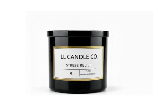 A black glass jar candle with a white label and gold border, labeled 'LL CANDLE CO. STRESS RELIEF' on a clean white background.