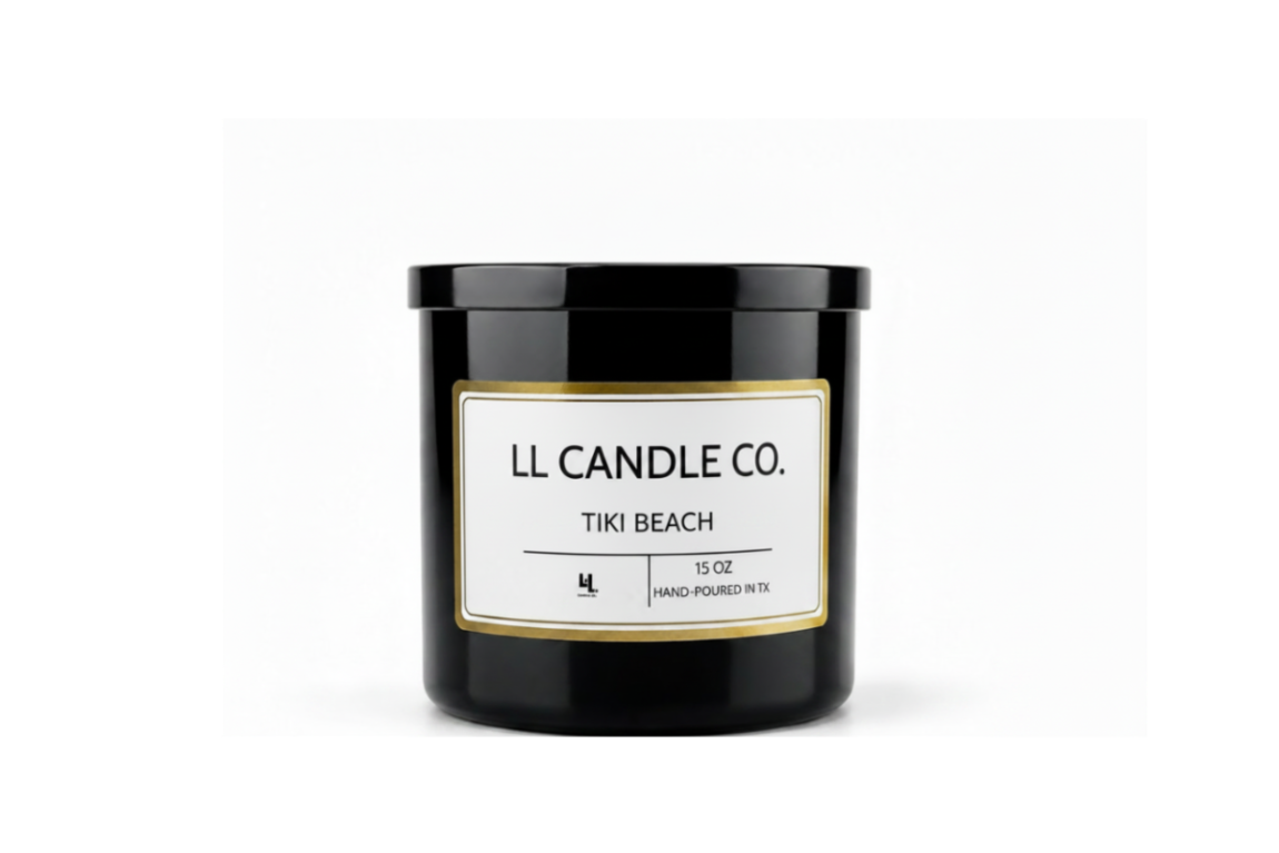 A black glass jar candle with a white label and gold border, reading 'LL CANDLE CO. TIKI BEACH' on a clean white background.