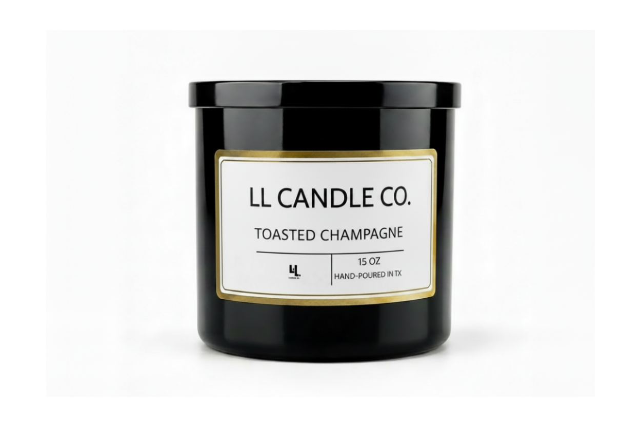 A black glass jar candle with a black lid and a white label featuring gold trim. The label reads 'LL CANDLE CO.
